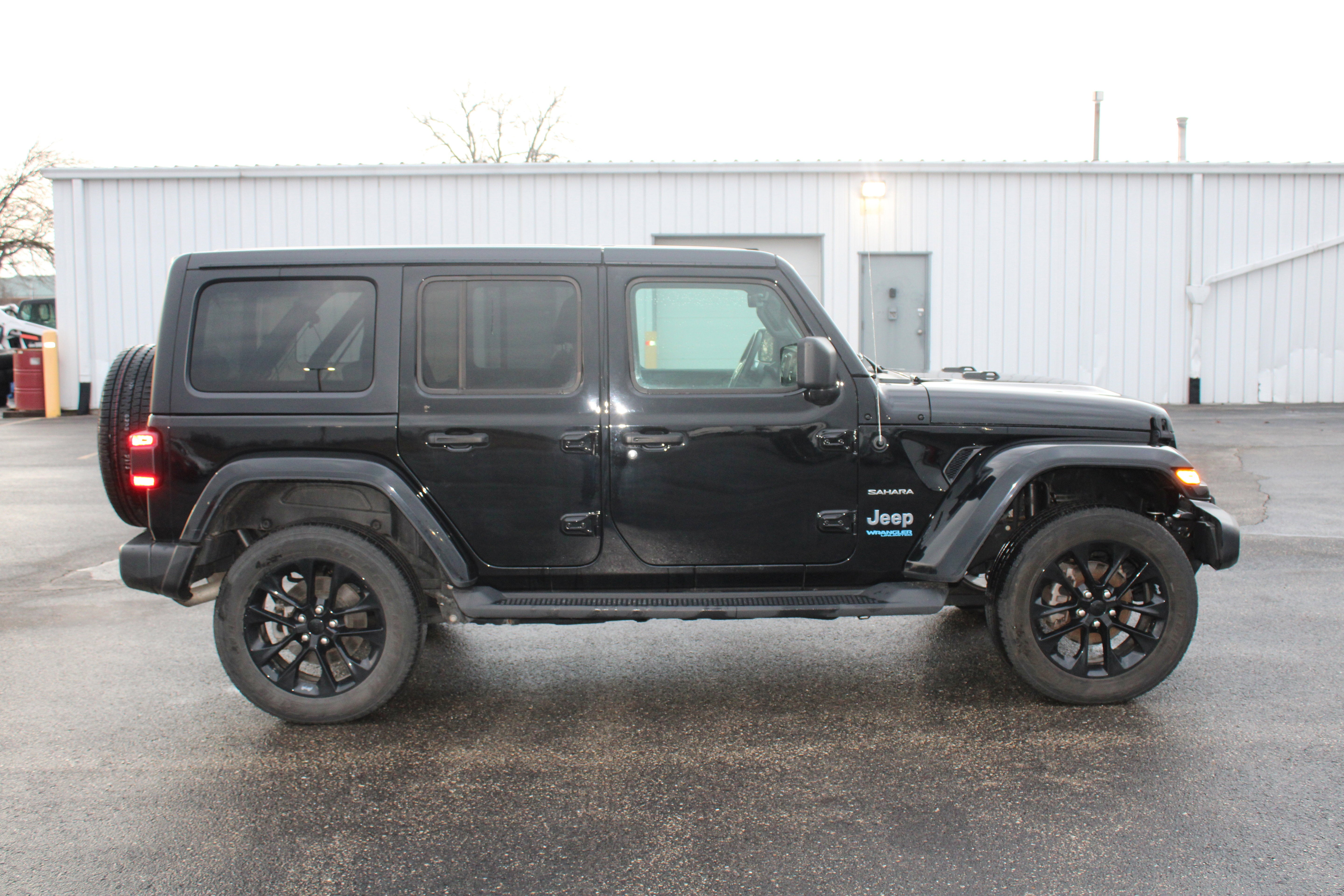 Used 2021 Jeep Wrangler Unlimited Sahara 4XE with VIN 1C4JJXP60MW799592 for sale in Salem, WI